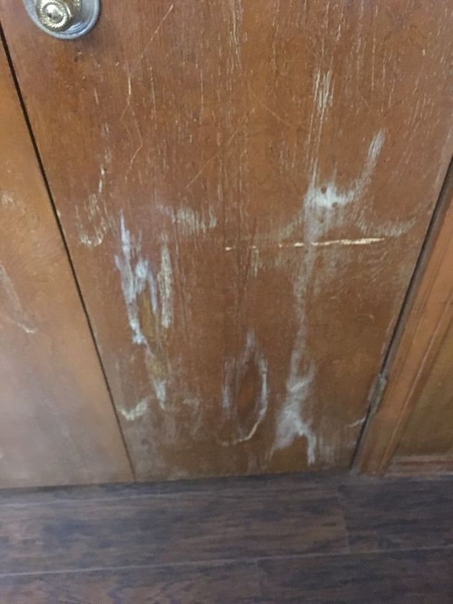 q how to refinish wood paneling with white marks