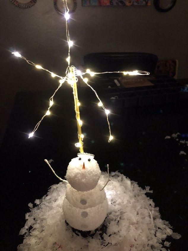 star of wonder snowman, Raise its stick arms