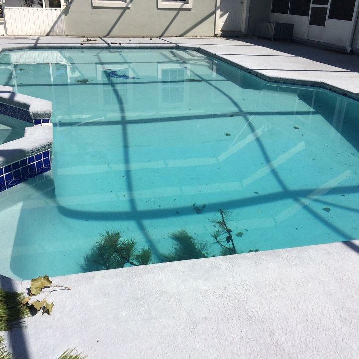 q what to do with dull grey concrete in enclosed pool area