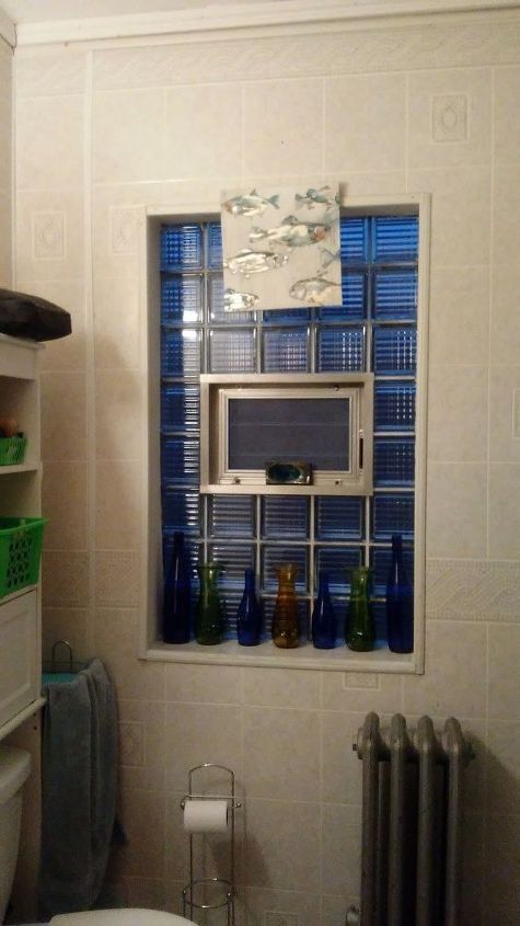 q what can i do with awful plastic paneling in my bathroo but i am ni