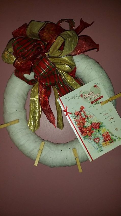 christmas card holding wreath