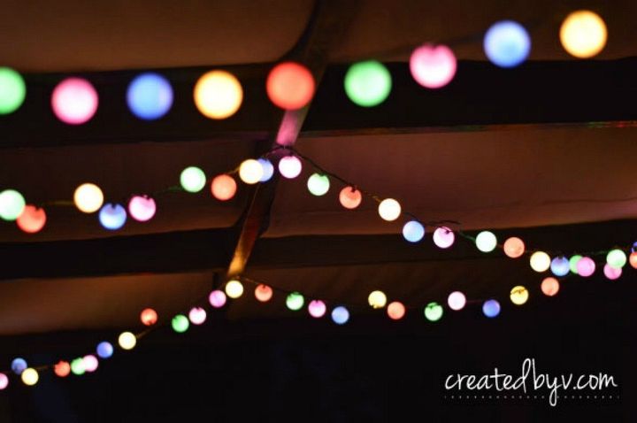 15 unexpected ways use christmas lights in your home, Make colorful globes with ping pong balls