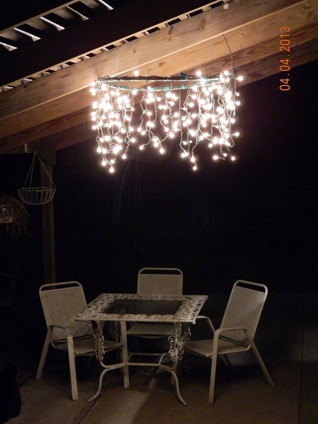 15 unexpected ways use christmas lights in your home, Make a hula hoop chandelier for yard parties
