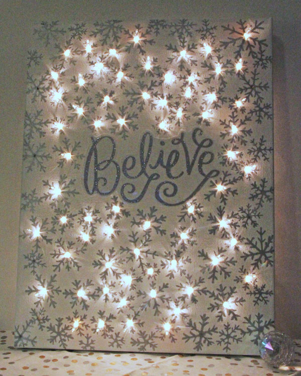 15 unexpected ways use christmas lights in your home, Make a lighted Christmas canvas