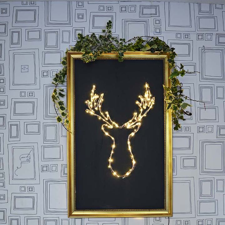 15 unexpected ways use christmas lights in your home, Create an illuminated deer decor