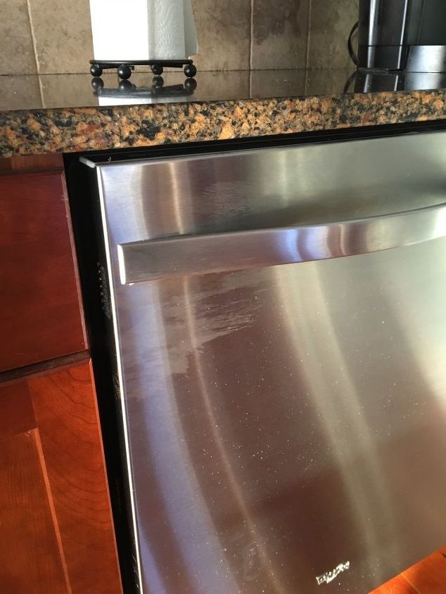 q how to remove residue on dishwasher