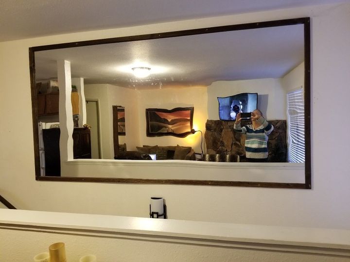 q i have a 4 x 8 mirror that was hung incorrectly over stairway