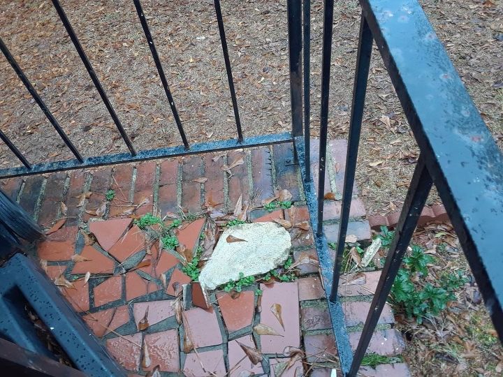 q how to fix a back patio that has broken brick tiles