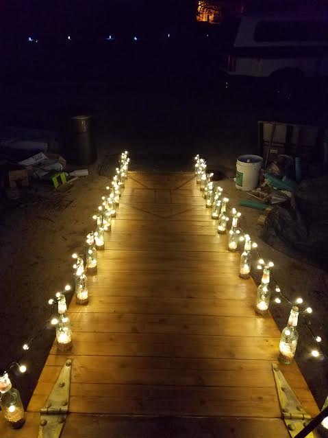 15 unexpected ways use christmas lights in your home, Turn them into pretty pathway lights