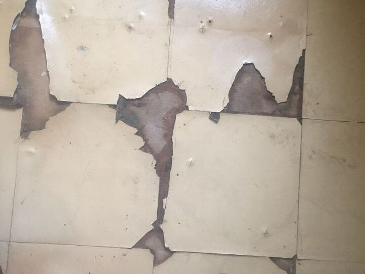 q would you paint a bathroom floor and use throw rugs on them