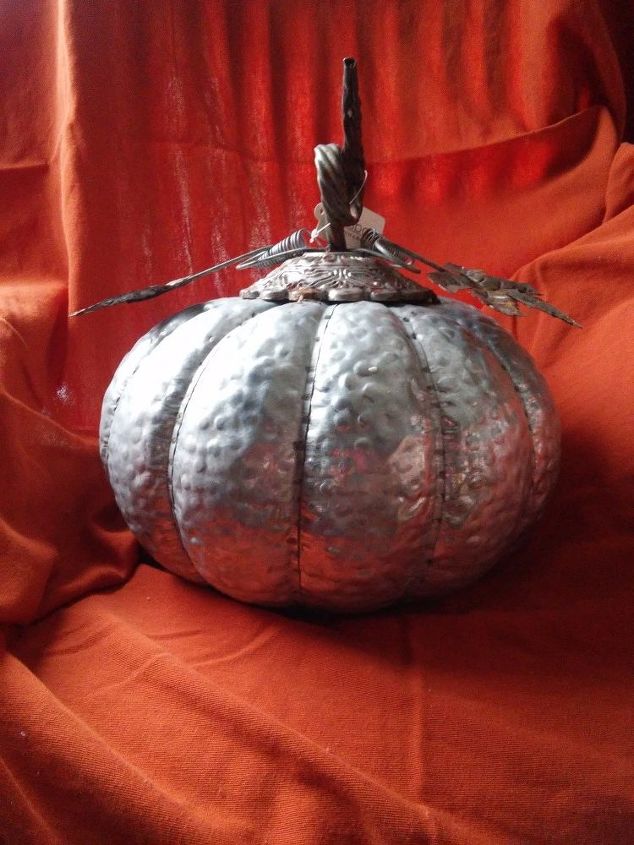 q does anyone know where i can order these metal galvanized pumpkins