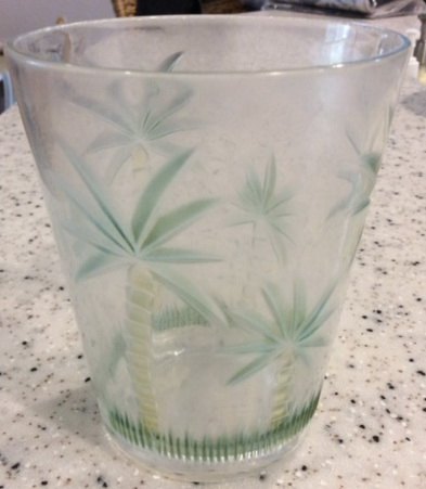 q how do i clean film from plastic drinking glass