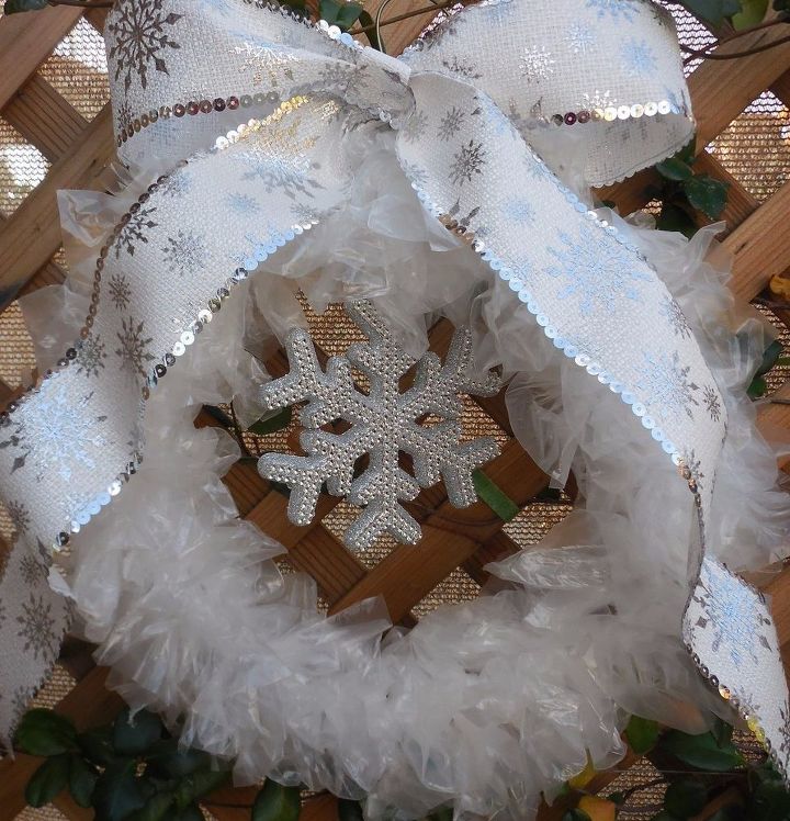 s 20 wintery wreath ideas that you ll want to make for your home, Simple Elegant Wreath