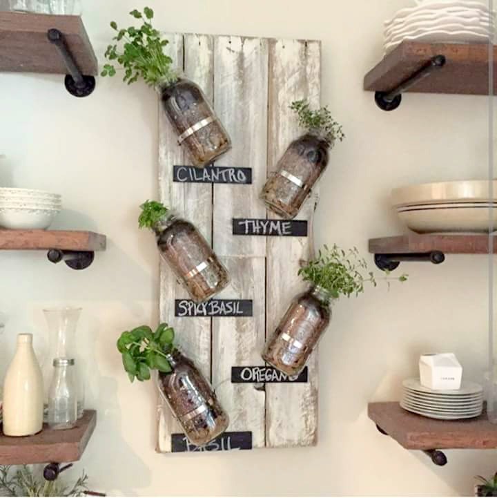 s these herb garden ideas will make you want to start one of your own, Mounted Mason Jar Herb Garden