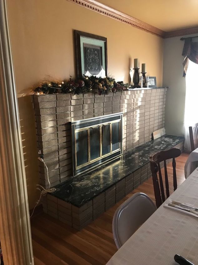 q what should i do to update an off centered and outdated fireplace