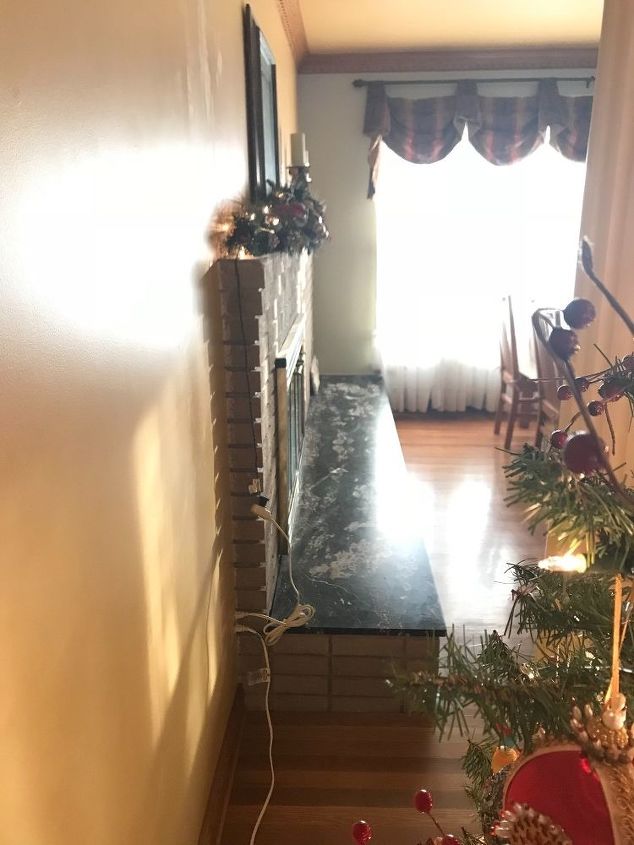 q what should i do to update an off centered and outdated fireplace