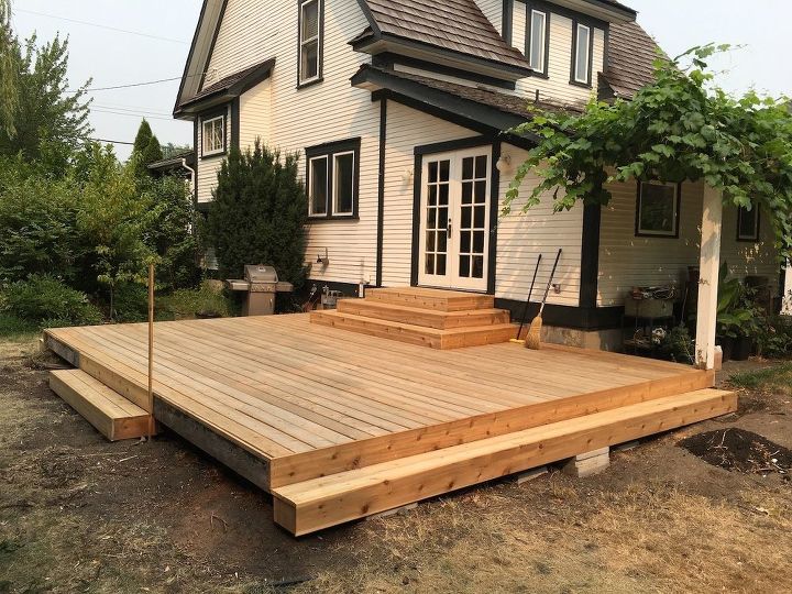 cedar deck remodel with new planter box benches, Installing New Decking