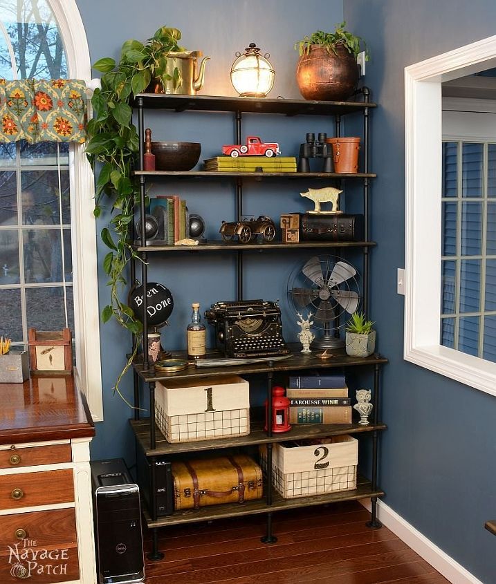 the best industrial style diy ideas for your home using pipes, Black Pipe Pine Shelves