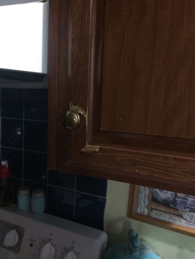 q how do you get wood colored paper off cabinets and then what do i do