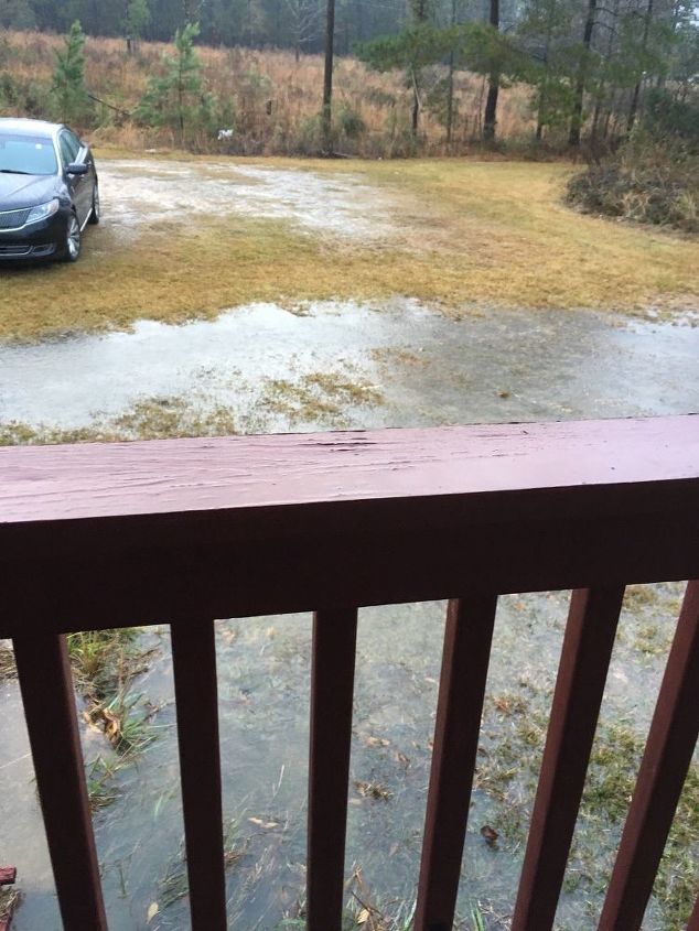 q how can i stop this water from coming onto my property