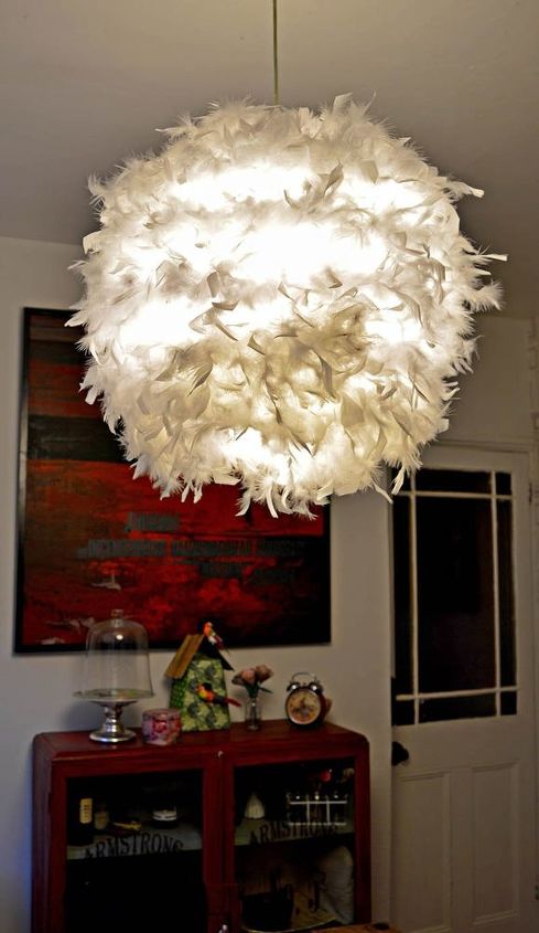 s 25 impressive ways you can update your ikea purchases, Add a feather boa to a paper lampshade