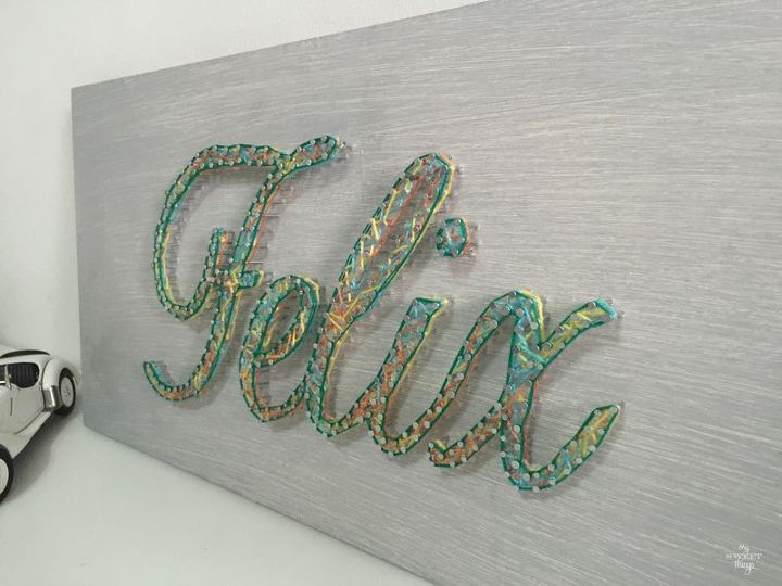 18 string art ideas that you ll want to hang in your home, Elegant name sign