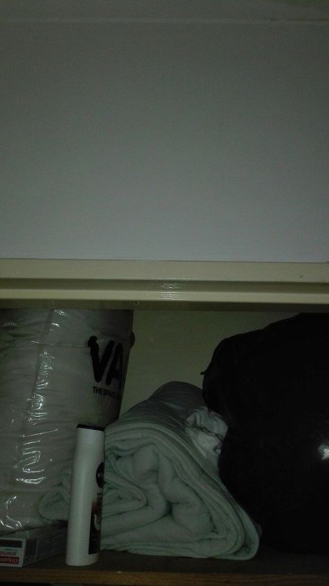 q hidden cupboards from the top of the cupboard door to the roof