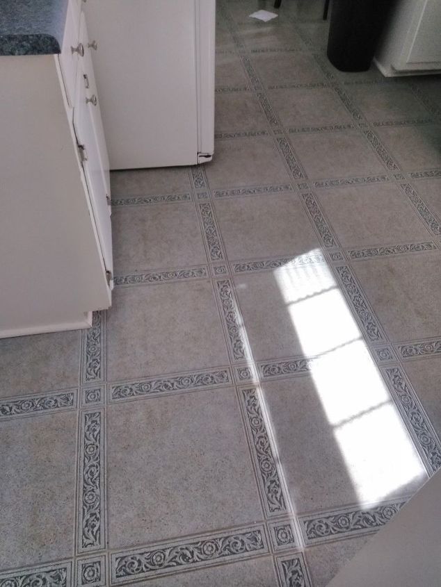 q what can i put over a linoleum floor short of pulling it up