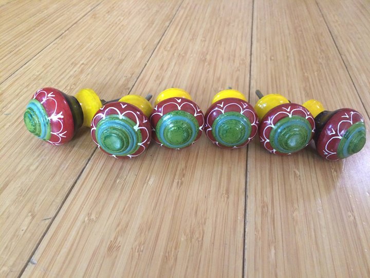 q idea to use pretty dresser drawer knobs