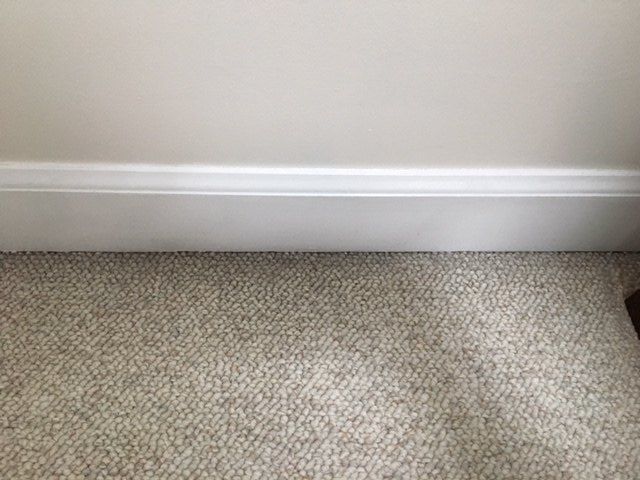 q how can you remove sooty stain from carpet around floor molding