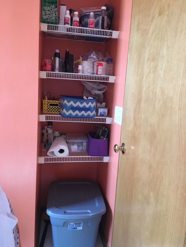 q how can i arrange this small master bath storage closet