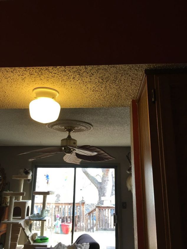 q what can i do about this ugly soffit above my cabinets to update it