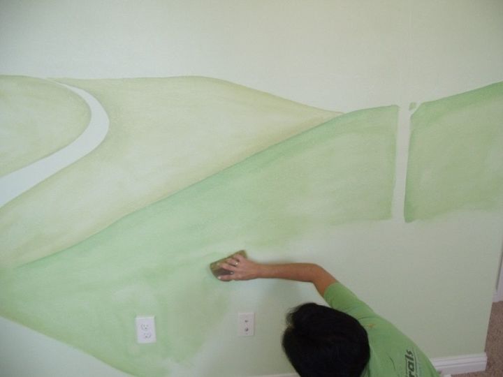 painting a mural with just a sponge