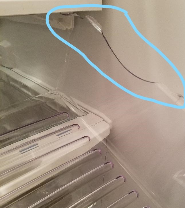 q repairing a refrigerator drawer