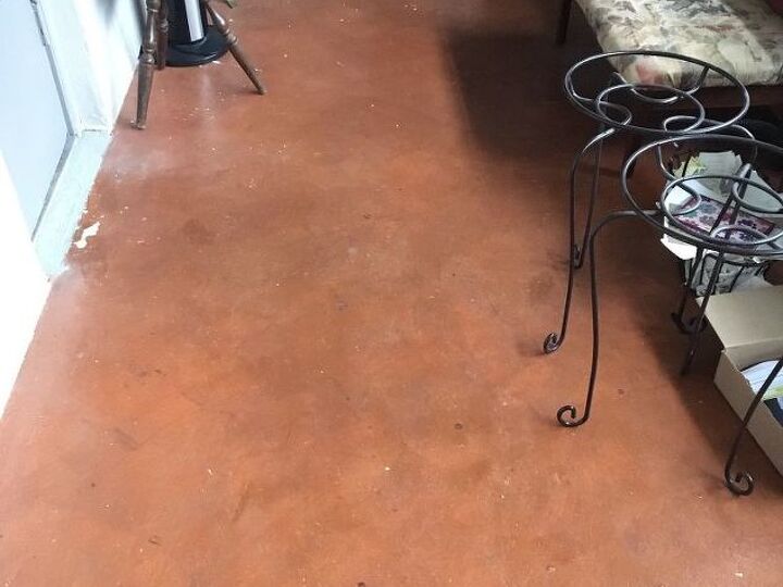 q need to tile stained concrete floor what prep to do for adherence