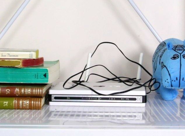 Cover up Your Ugly Router with an Old Book | Hometalk
