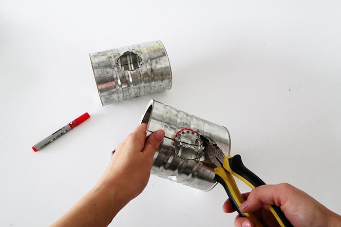turn a tin can into a stylish wall lamp