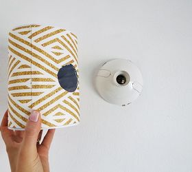 turn a tin can into a stylish wall lamp