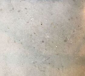 how can you remove grease stains on polished inside cement floor