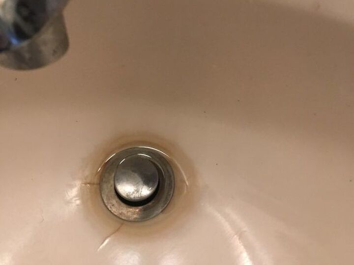 q the drain in my vanity is discolored does anybody know what i can