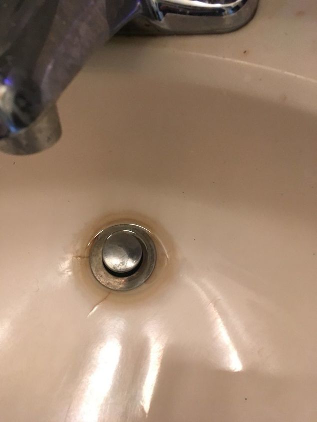 q the drain in my vanity is discolored does anybody know what i can