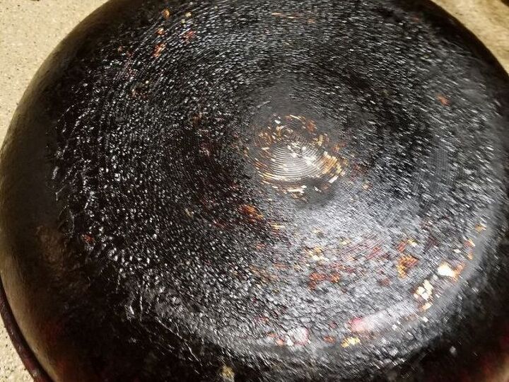 q how to clean long burnt on grea se