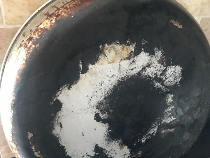 q how to get baked clean the blackened bottom to stainle pots pans