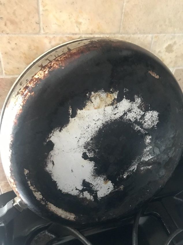q how to get baked clean the blackened bottom to stainle pots pans