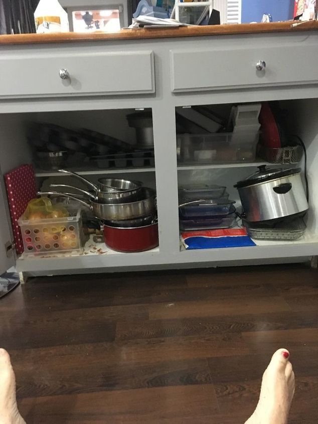 q help how can i organize the pots pans baking dishes etc under the k