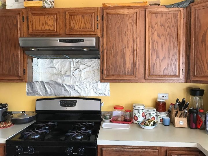 q what color should i use on the wall and the cabinets and what design