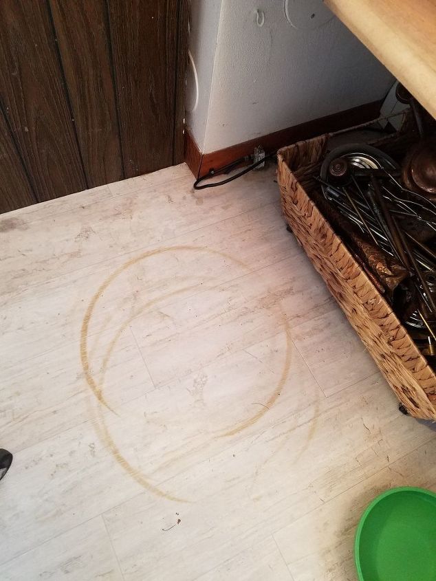 q how can i get rust stains out of my sheet vinyl floor