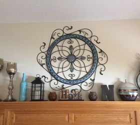 metal wall art hanging gets an easy dollar store fix