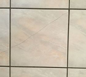 cracked floor tile repairs