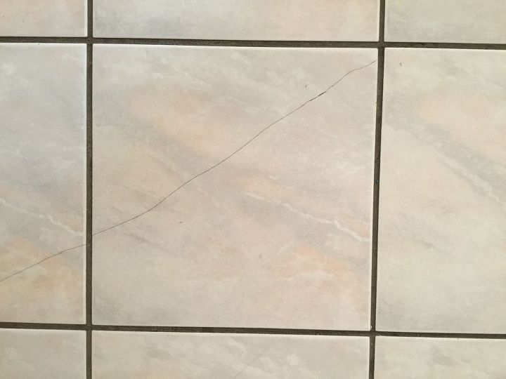 cracked floor tile repairs